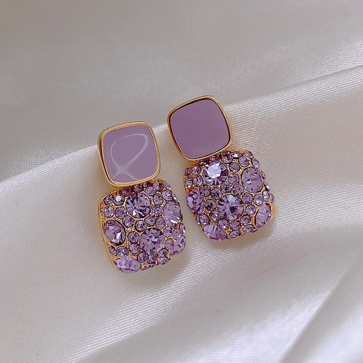 Boucles d'oreilles de luxe violettes avec incrustation de zircon