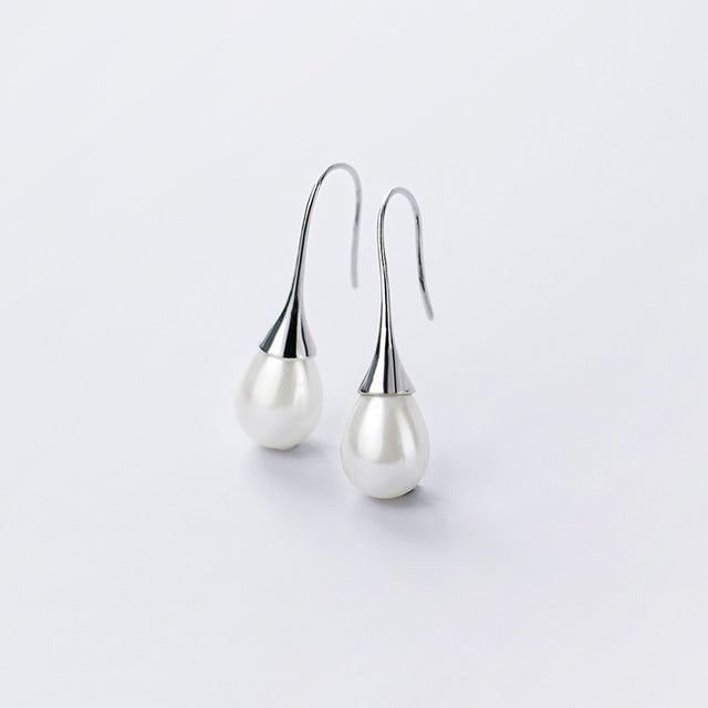 Boucles d'oreilles pendantes avec perles