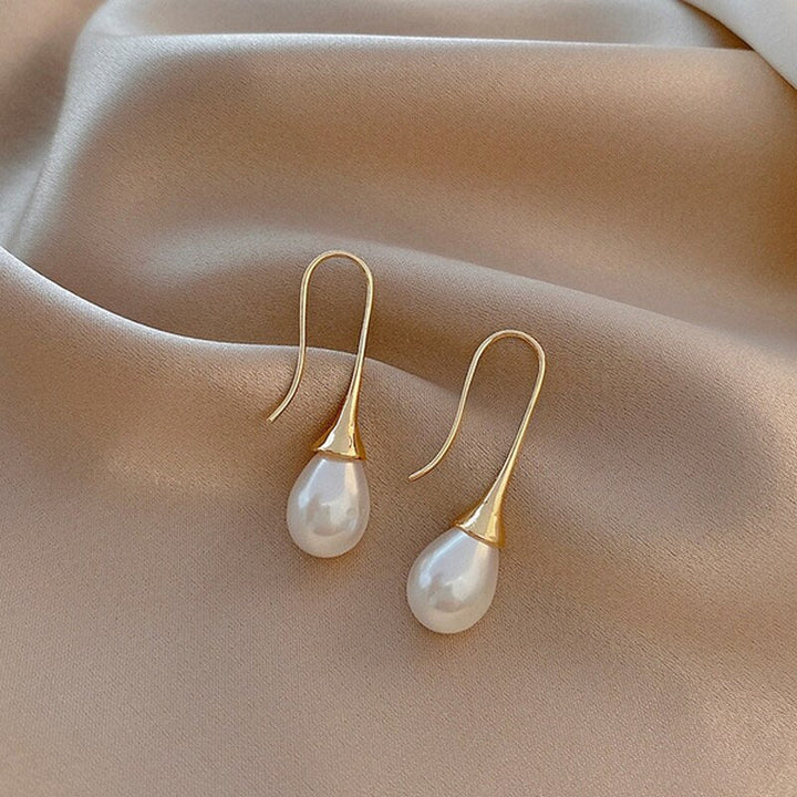 Boucles d'oreilles pendantes avec perles