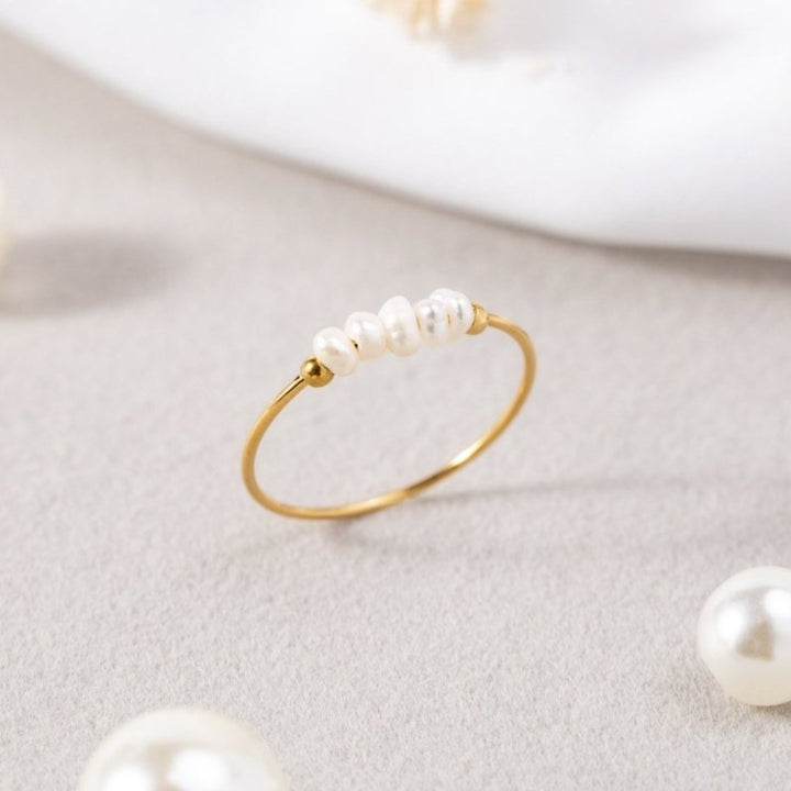 Bague classique avec perle d'eau douce