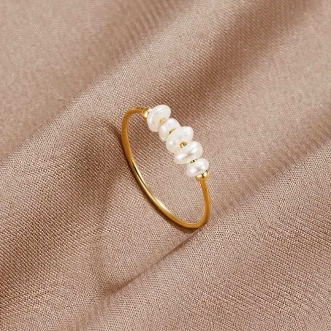 Bague classique avec perle d'eau douce